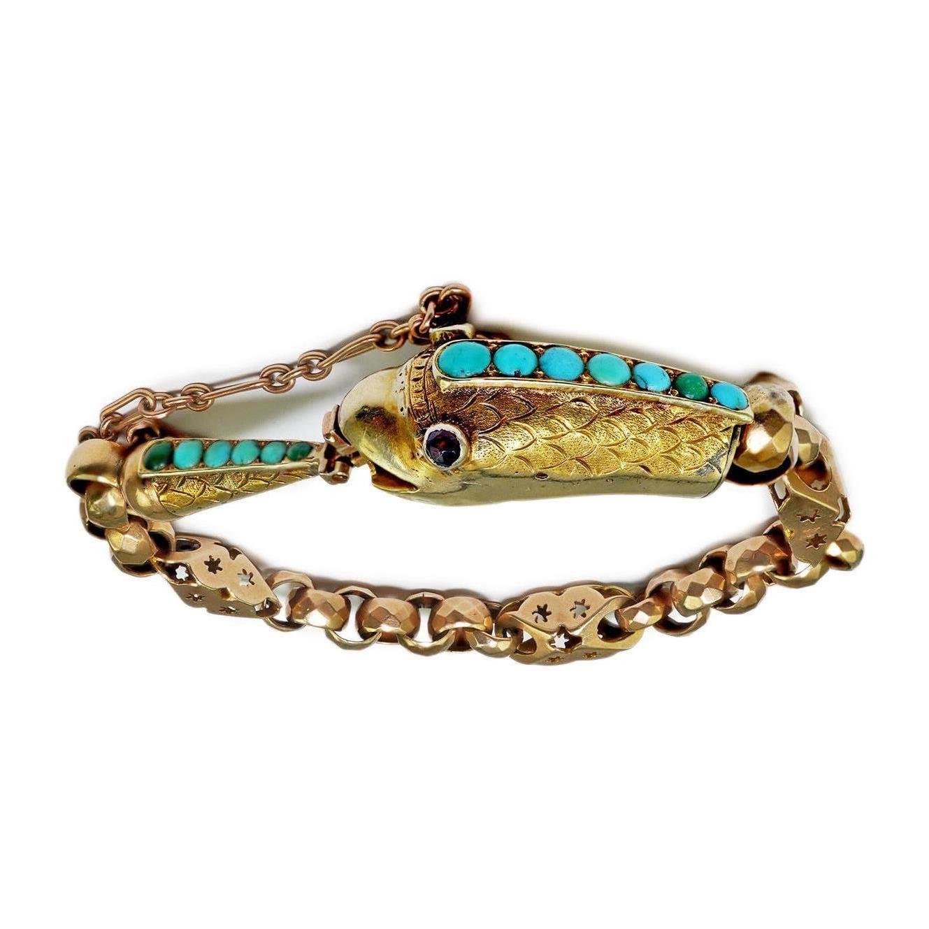 A Victorian gold and turquoise cluster set serpent bracelet